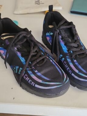 Skechers Women’s Black Athletic Sneakers with Iridescent Blue-Purple Accents